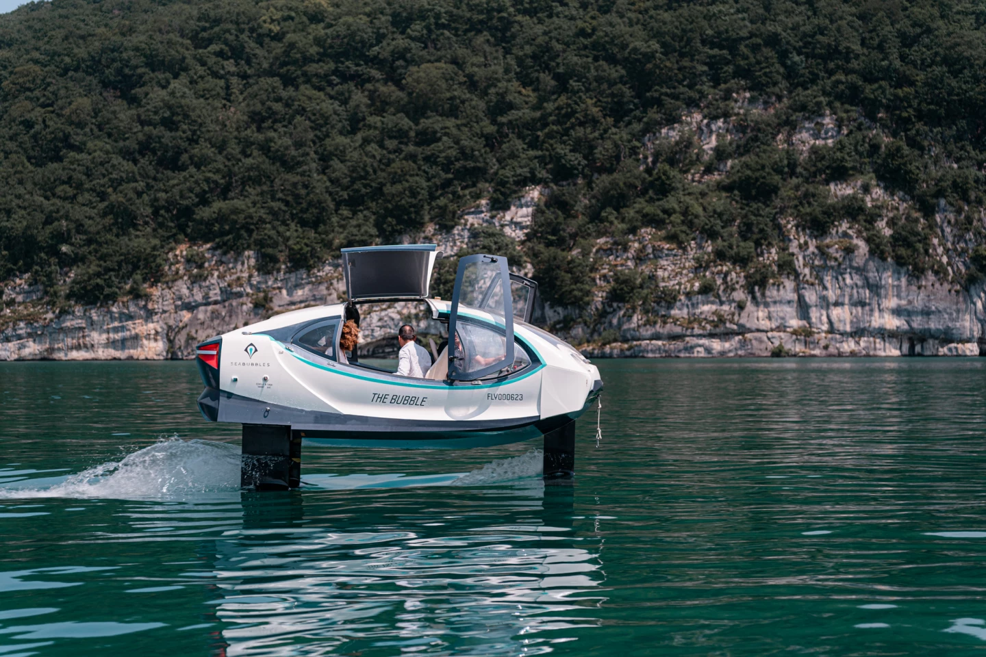 The Bubble rises above the water at 7 knots and can cruise at 13 knots, with an onboard control system auto-stabilizing the electric water taxi as it motors along