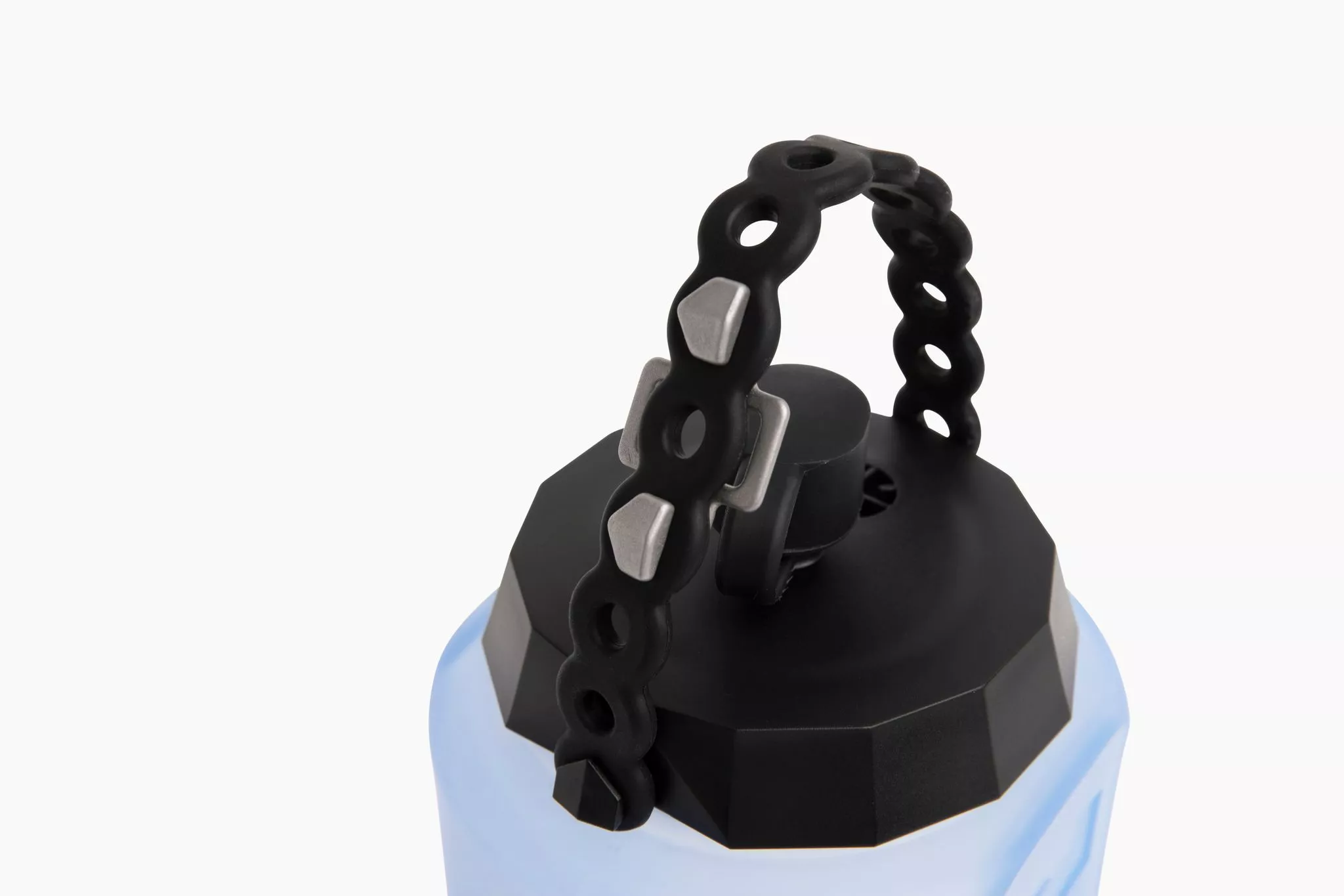 The Infinity Tool started out as a Superloop handle for MODL's bottle, and the notch on the bottle lid inspired the Studlink for the standalone multitool strap