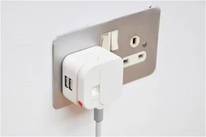 The adapter with three Folding Plugs takes barely more room than a standard UK plug (Credit: Min-Kyu Choi)