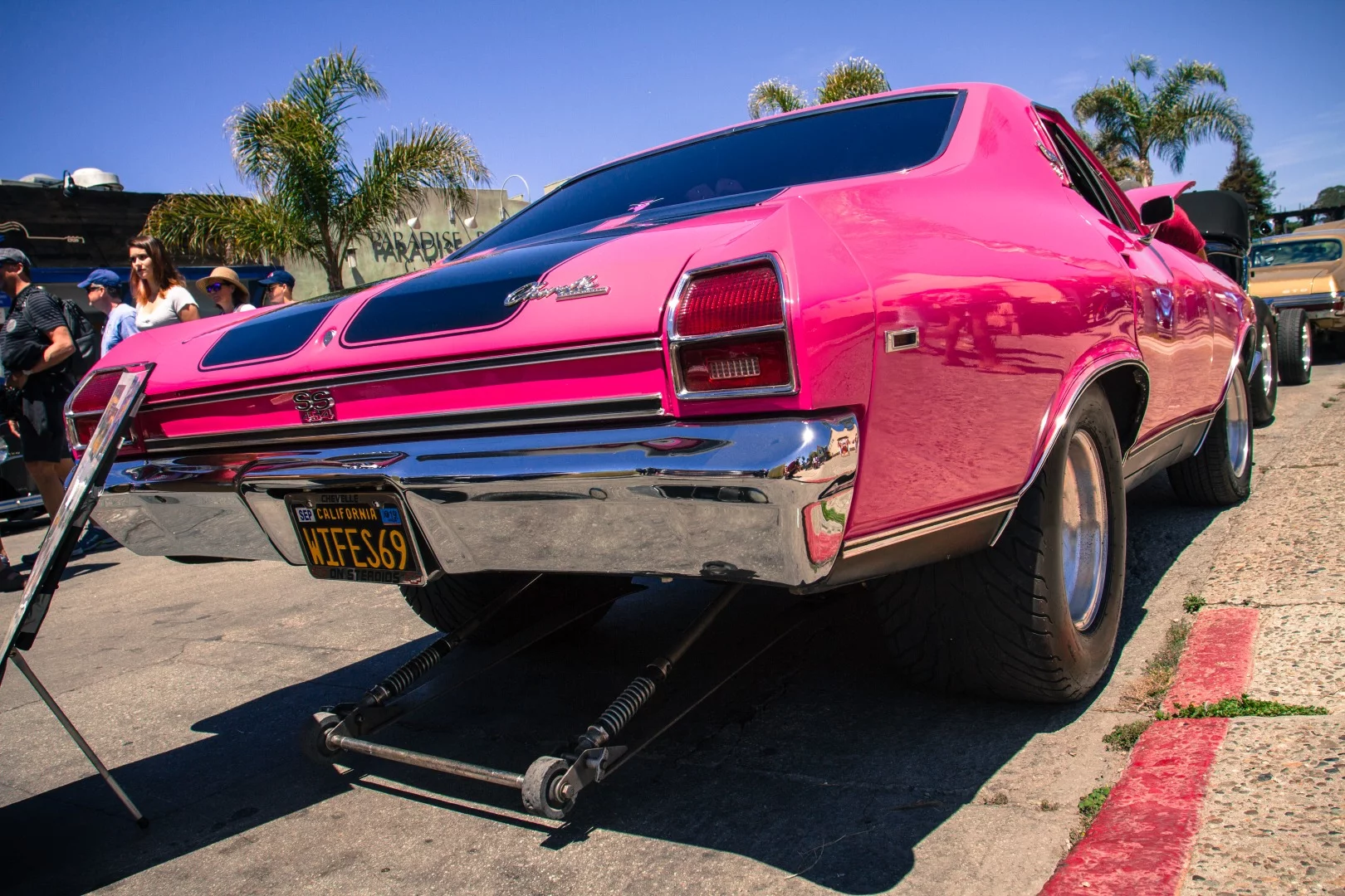 This 1969 Chevy Chevelle has an interesting story. The owner's husband had it in 1983. In 1985, he sold it. In 2013 the wife found it sitting in a barn and purchased the car back before restoring it into what you see now, based off a 1969 Chevelle Hot Wheels car ... drag bars and all