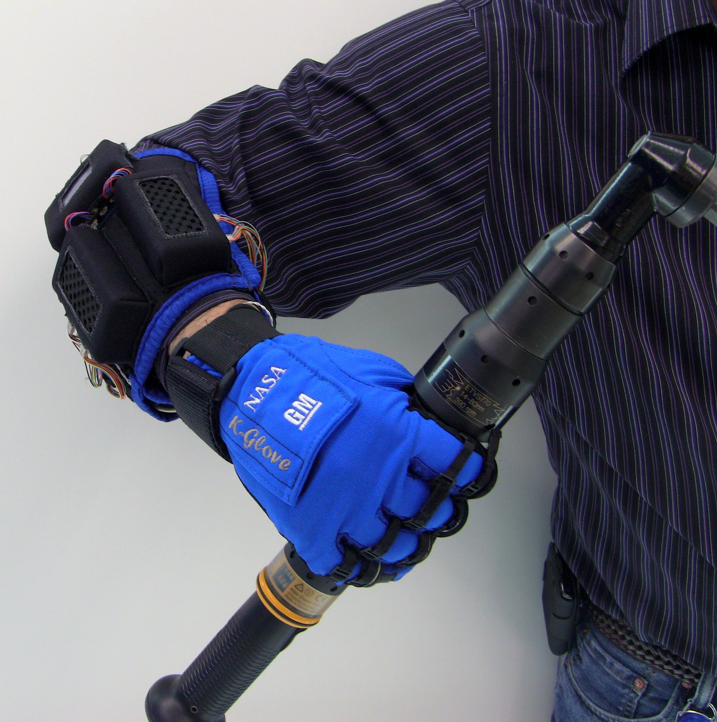 NASA and GM engineers have created Robo-Glove, a power-assisted glove designed to keep astronauts and autoworkers from getting repetitive stress injuries