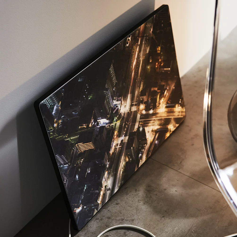 The picture frame speaker can be hung on a wall, or stood on the floor and leaned against the wall