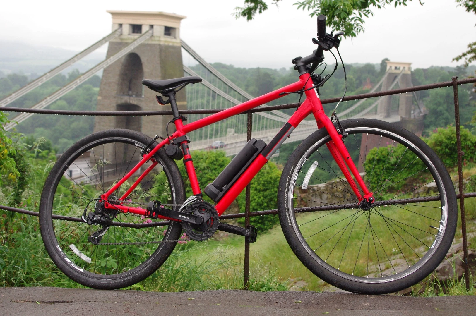 The Revos add-on e-bike kit is made up of a drive unit, pedal sensor and battery pack