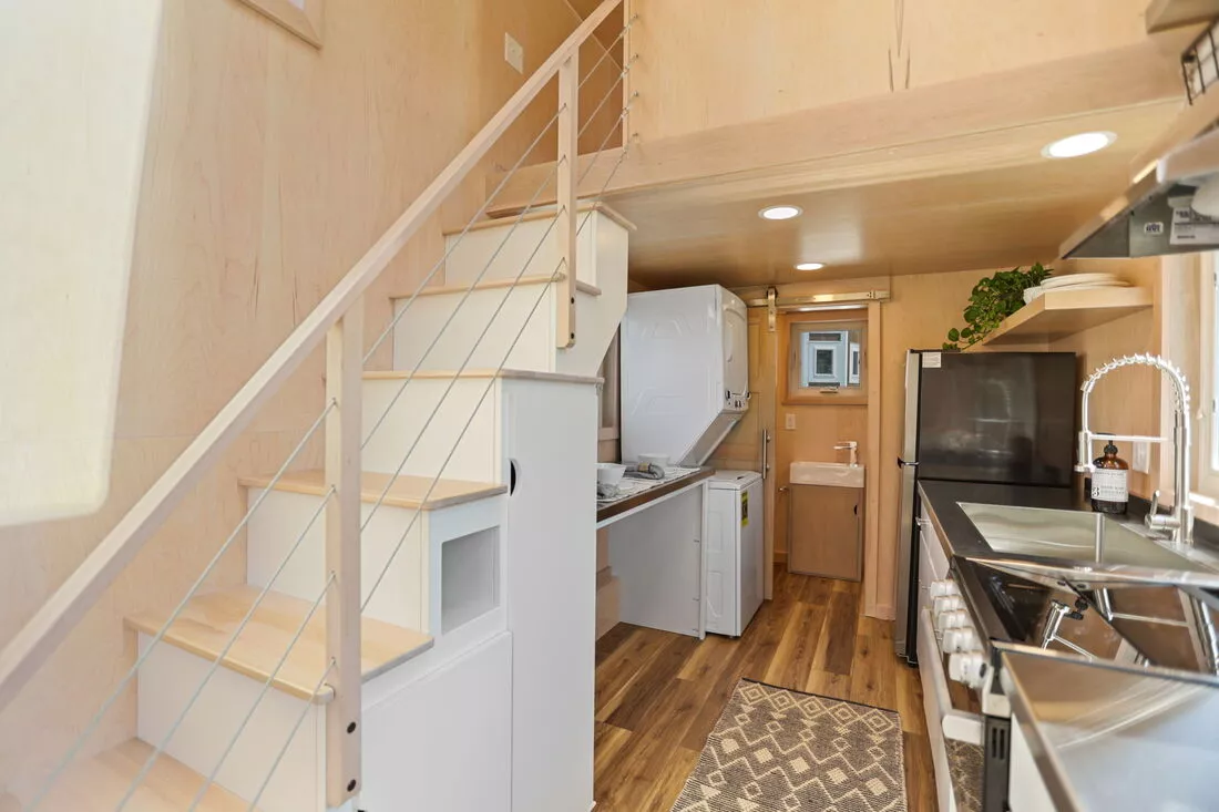 The Sea Chord's kitchen includes a breakfast bar dining area for two