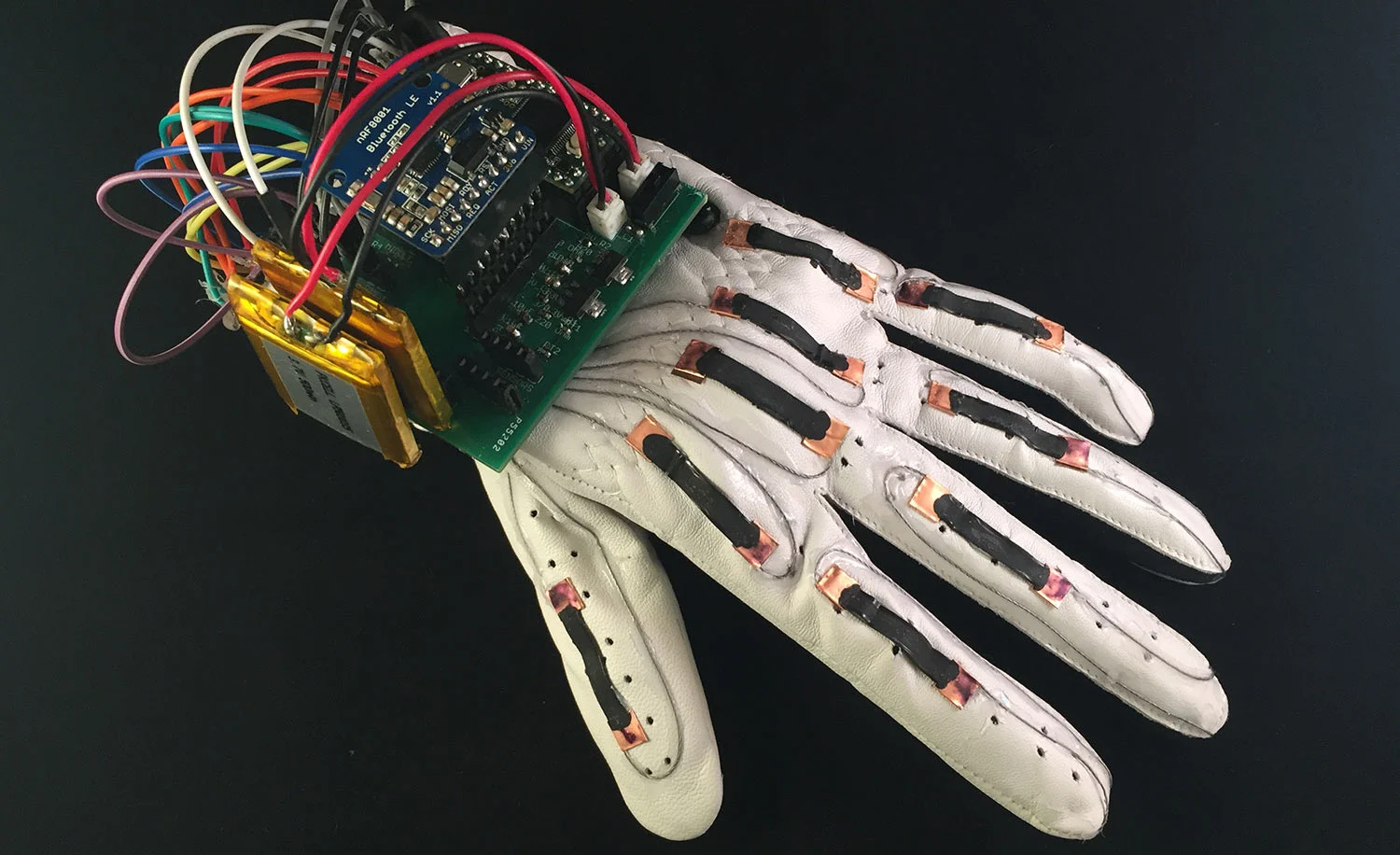 The Language of Glove is a sensor-packed glove that translates the gestures of sign language into text