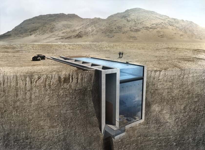 Casa Brutale is defined by its thick, unfinished concrete slabs and topped by a reinforced glass pool that doubles as a roof
