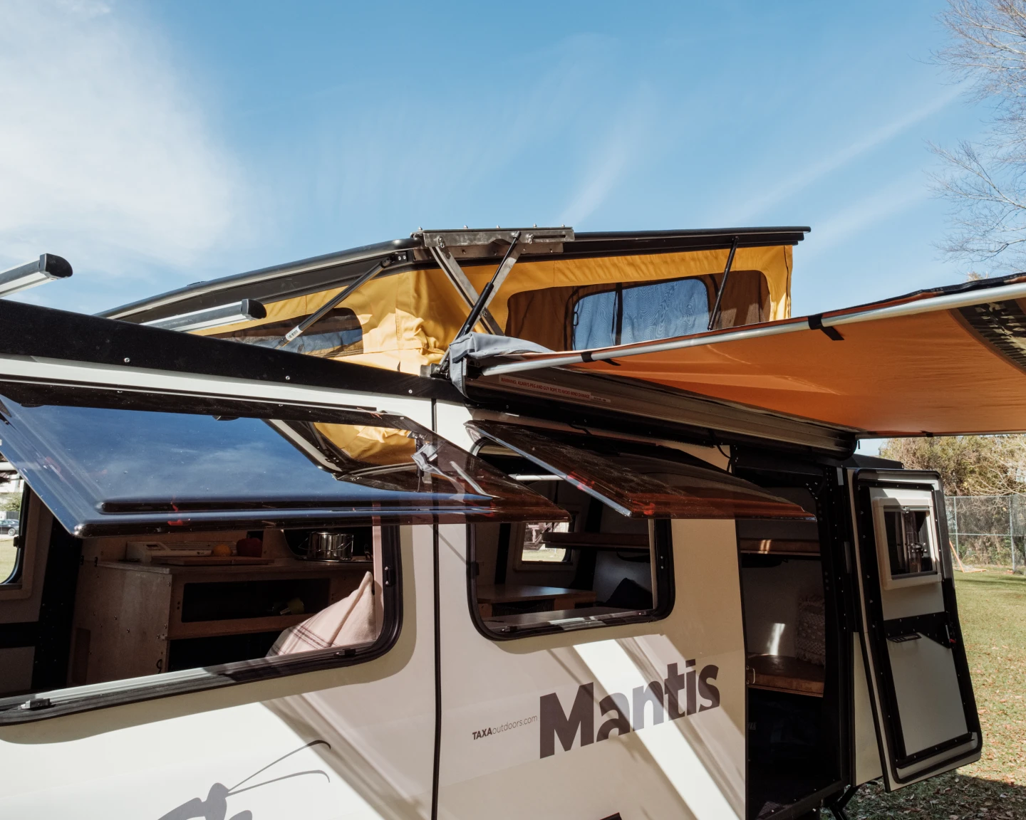 Taxa adds a few new tricks to its funky Mantis camping trailer