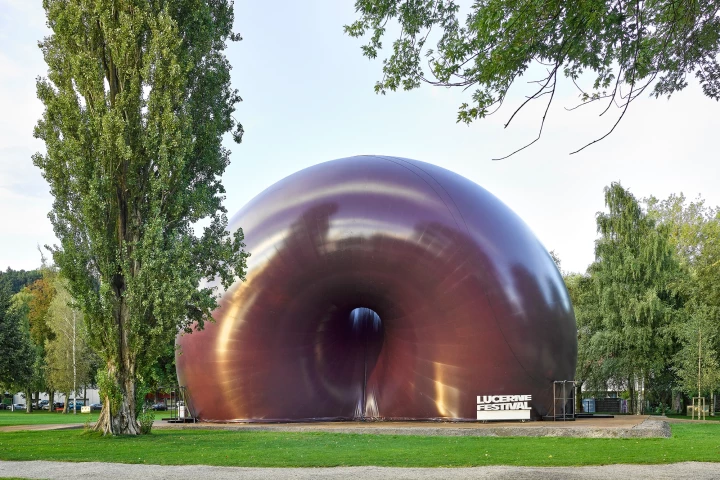 Looking a bit like a massive purple donut, the Ark Nova is an unusual concert hall that inflates to host up to 500 people