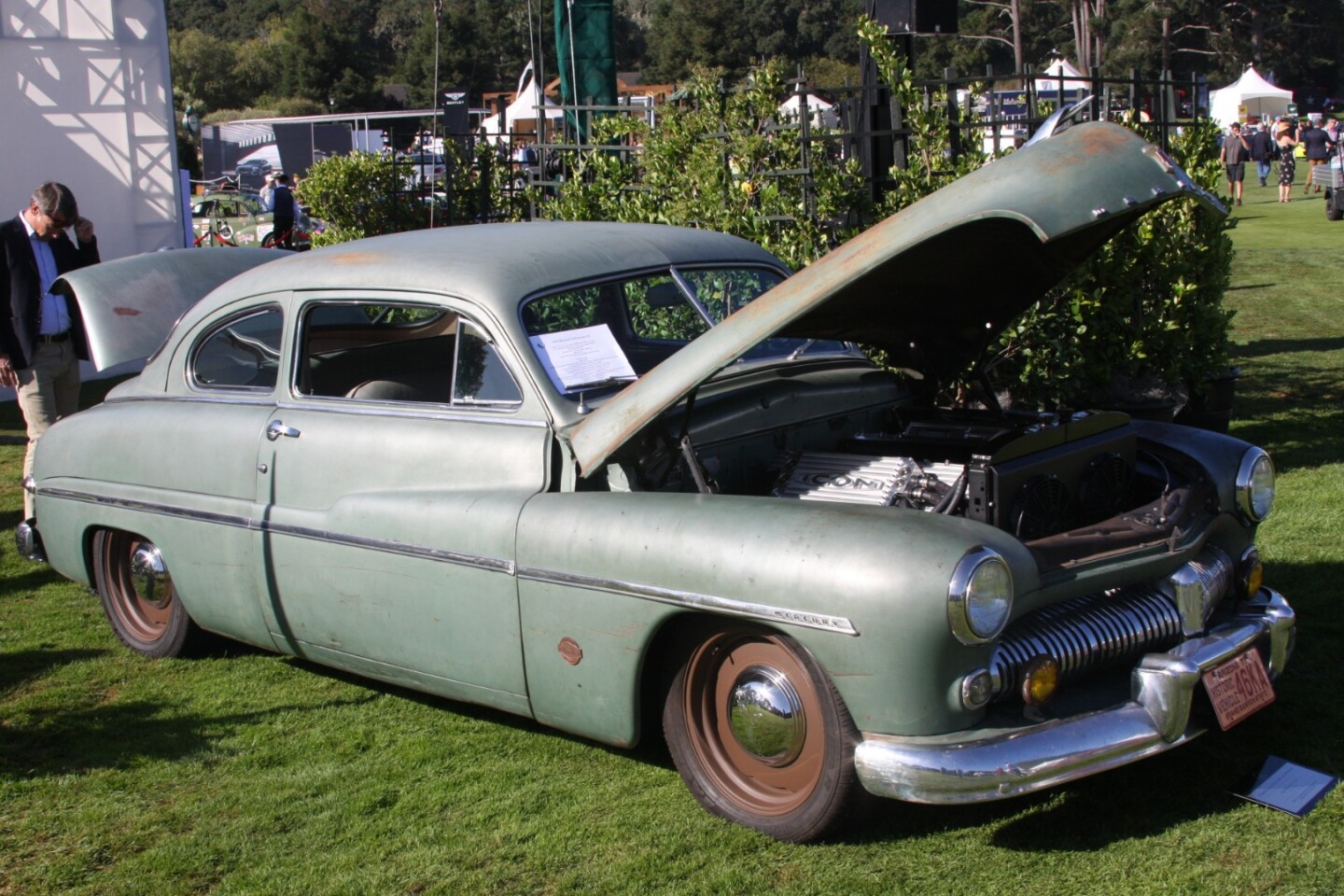 This 1949 Mercury ICON Derelict EV is one of the most unique automobiles you'll ever see. On the outside it sports a 70-year-old body with original paint, but on the inside it has a custom four-wheel-independent Art Morrison chassis, electric rack-and-pinion power steering, two 150kW motors and a full Tesla performance battery pack