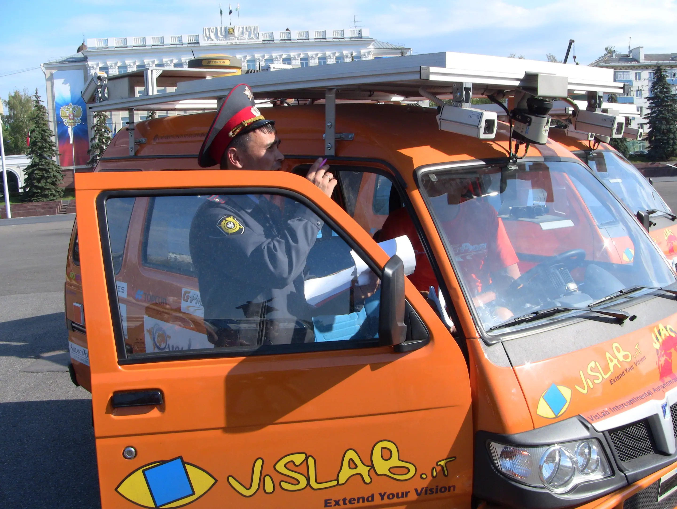 Russian police officer puzzled at driverless van