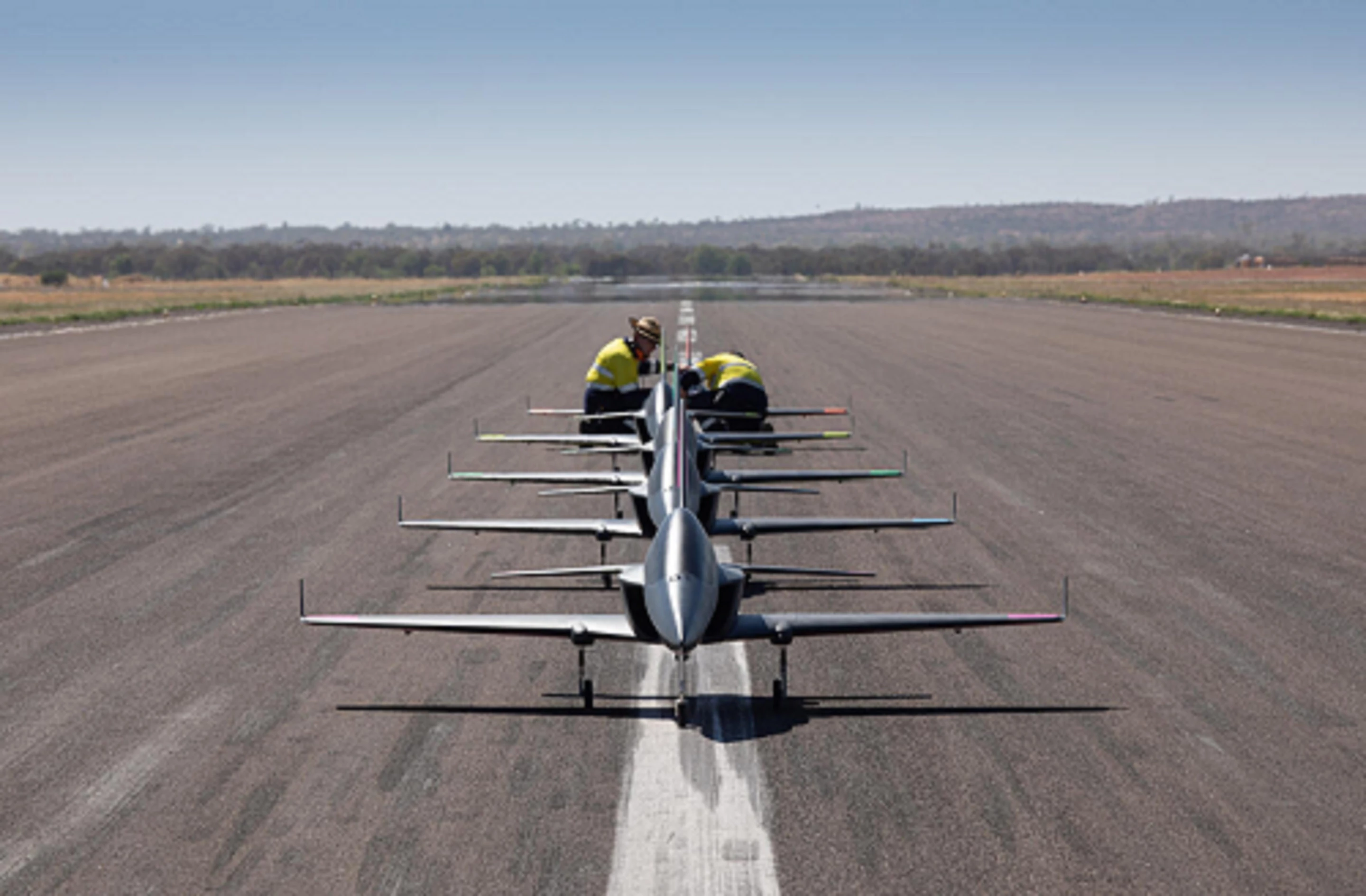 The squad of five autonomous jets being prepared for takeoff