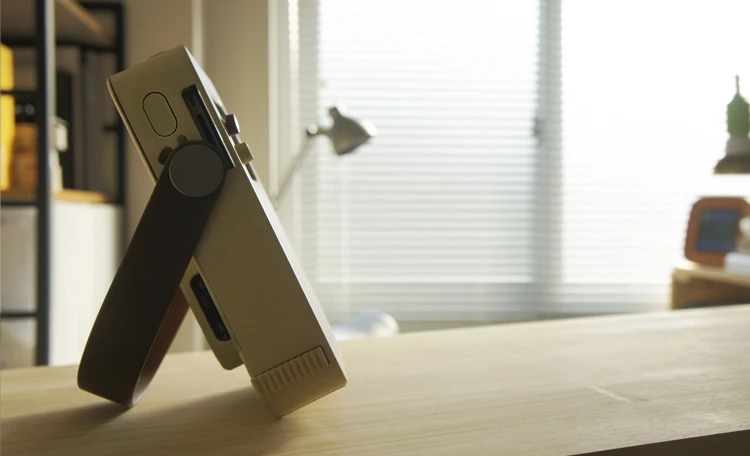 The speaker's handle also features a tilt-lock mechanism that enables it to be tilted to different angles