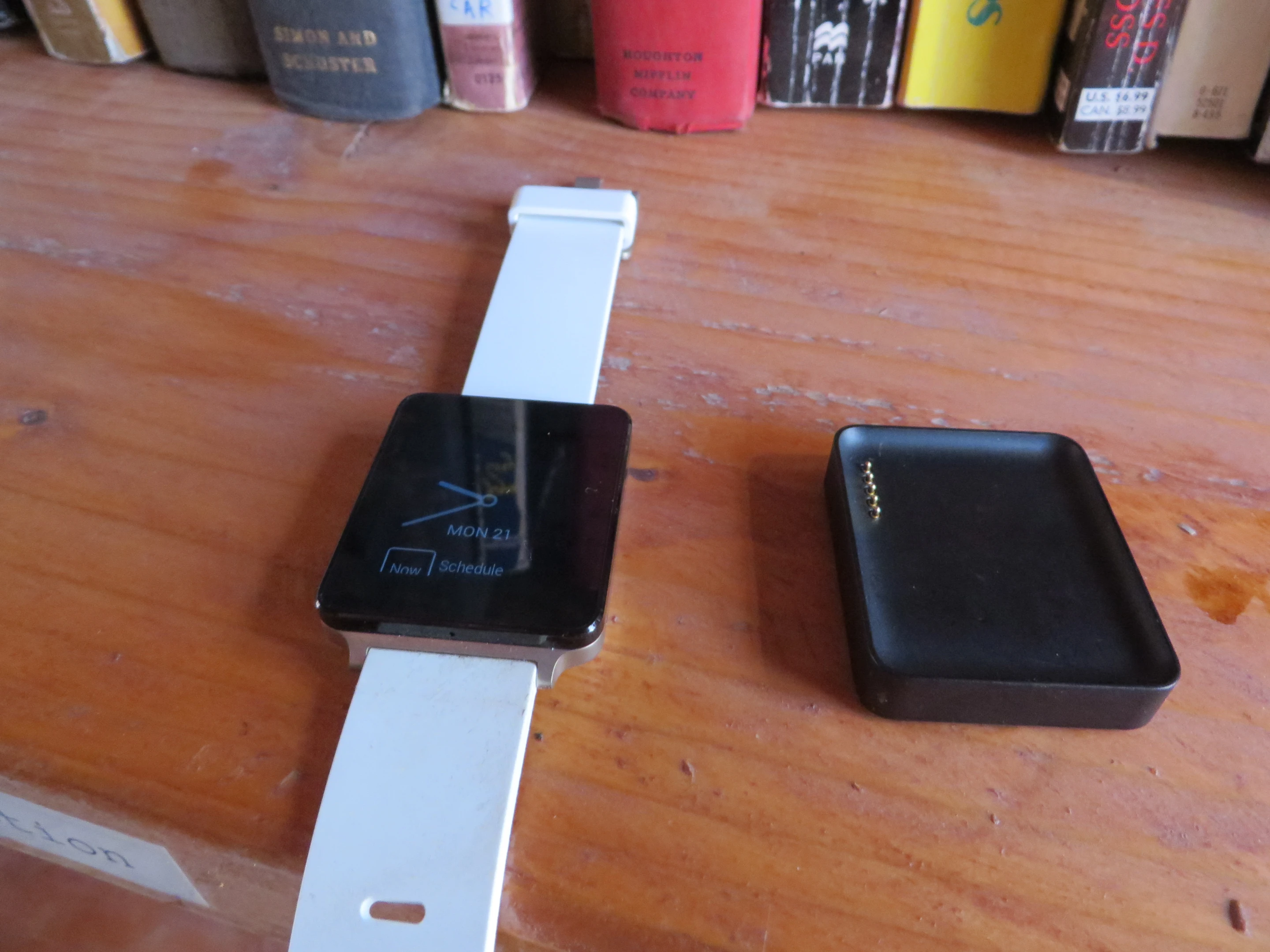 the G Watch and its magnetic charging station