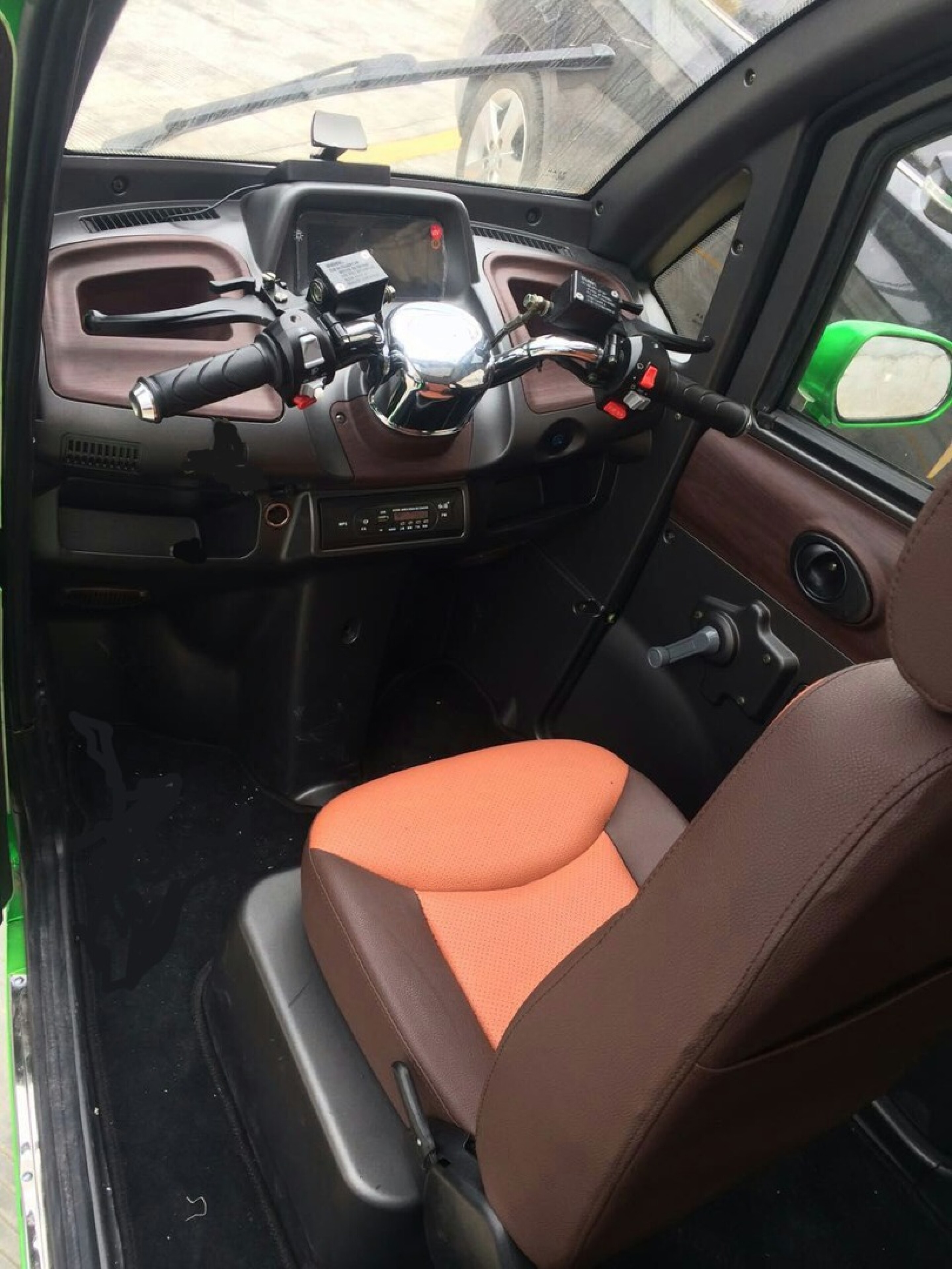 5,700 electric microcar seats 3, or carries 360 lb of cargo