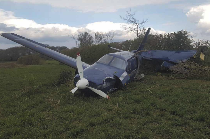 The test plane made a forced landing in a field, losing a wing to a hedge before hitting a ditch and coming to an abrupt halt – nobody was injured