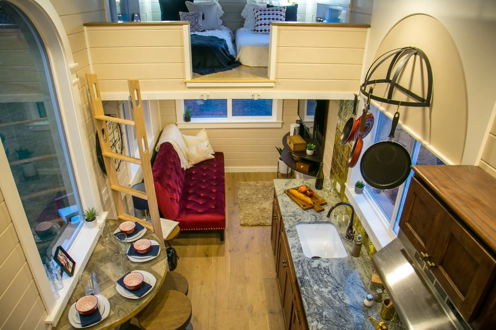 The Theater Home's kitchen features a small semi-circular dining table