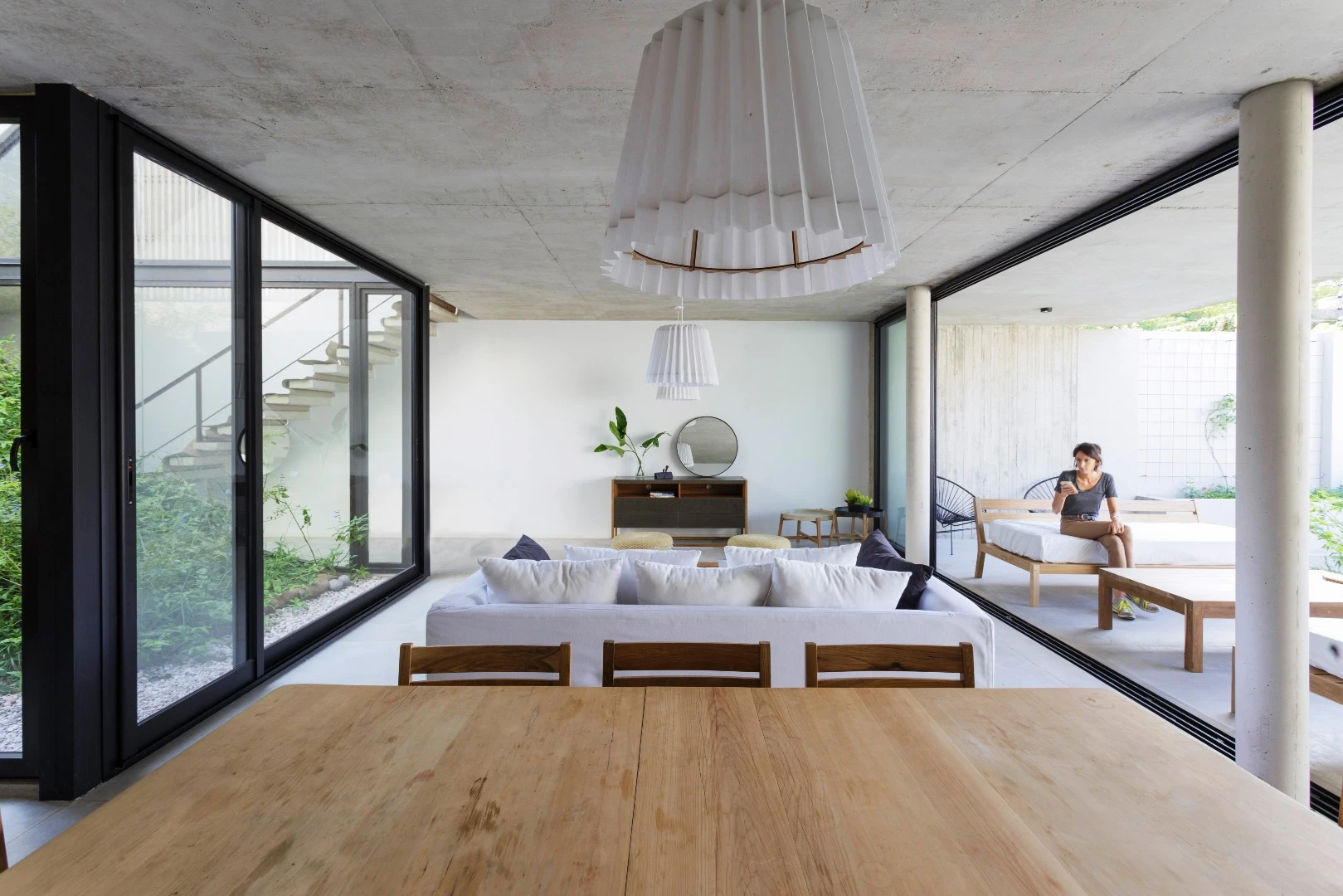 The MeMo House's ground floor includes this dining area, which can be opened to the outside