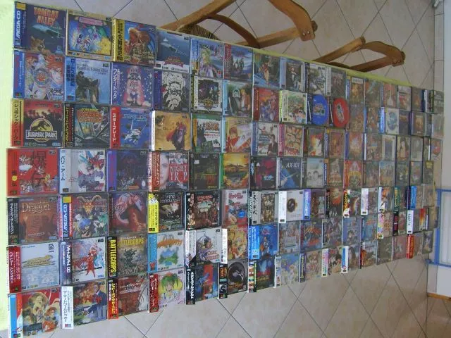 A tabletop full of Mega CD games which made up part of an eBay auction