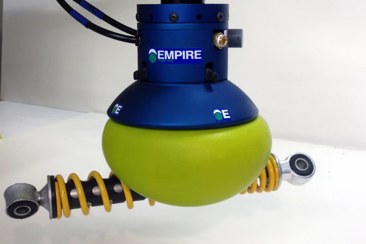 The Versaball grasps a shock absorber