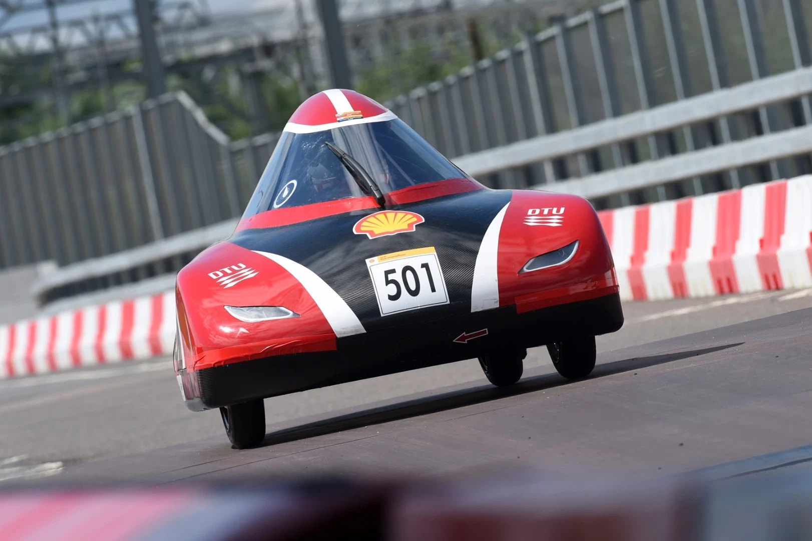 The DTU Dynamo, an ethanol UrbanConcept racing for team DTU Roadrunners from Technical University Of Denmark, Kgs. Lyngby, Denmark, seen on the track during Make the Future London 2016