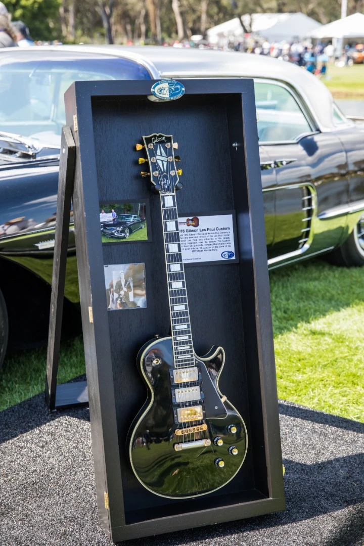 This is a 1964 Gibson SG Standard is from the John Oates Collection. Gibson introduced the Les Paul SG (Solid Guitar) in 1961. The sharp cutaways and beveled edges were an effort to modernize the Les Paul model. In 1963, the “Les Paul” name was dropped and the “SG” became a separate model. Angus Young, lead guitarist for AC/DC, is known for playing the SG, making this guitar the perfect complement to AC/DC lead singer Brian Johnson’s 1928 Bentley “Thunder Guts”
