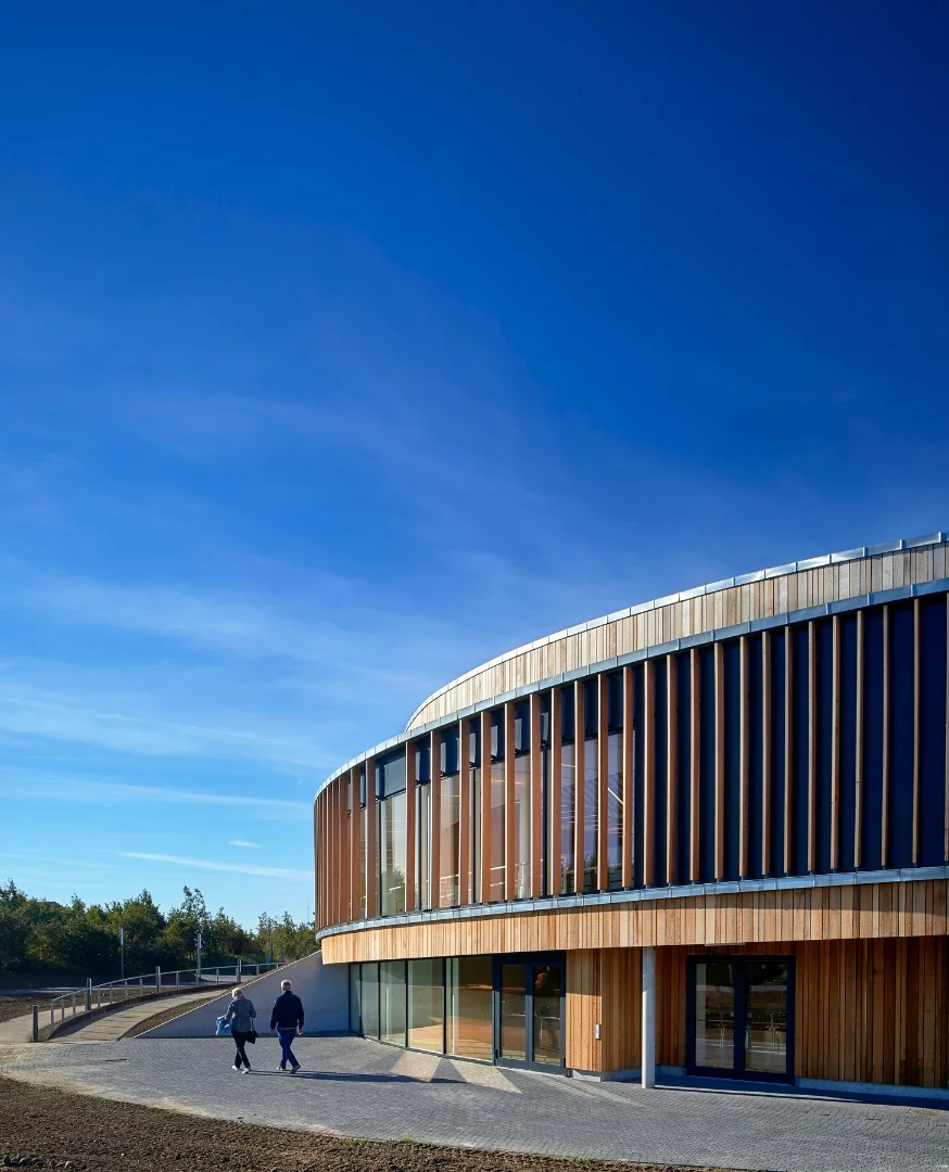 A 100-m (328-ft) spiralling ramp is wrapped around the outside of the circular sports hall