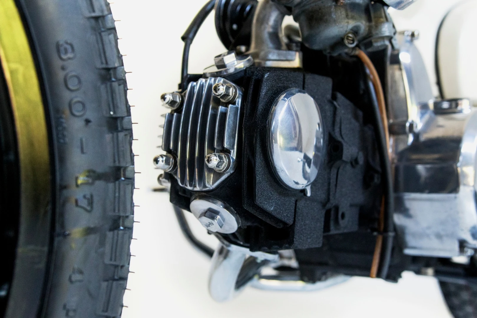 The original Honda C70's engine was replaced with a more reliable, and more powerful, engine from a Honda Astra