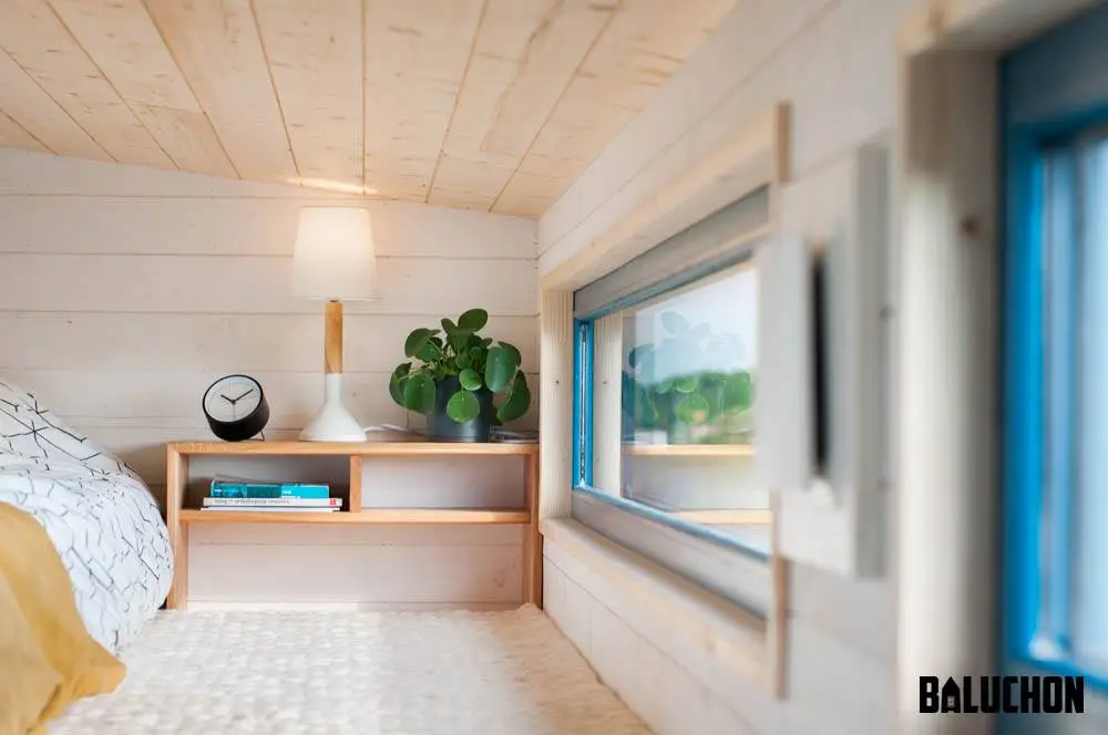 The Valhalla's loft bedroom includes a small bedside table