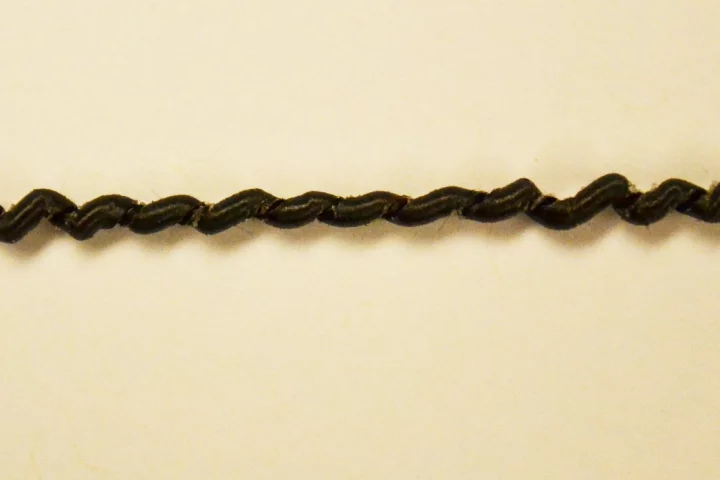A coiled, carbon fiber-based artificial muscle developed at the University of Illinois