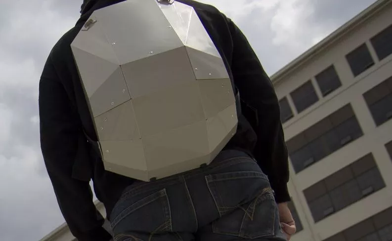 The Solid Gray backpack features a rigid foldable design, and is made from a single sheet of copolymer