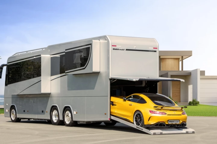 In addition to its grand tourer-sized garage, the Variomobil Perfect 1200 Platinum also includes three slide-outs for a spacious interior