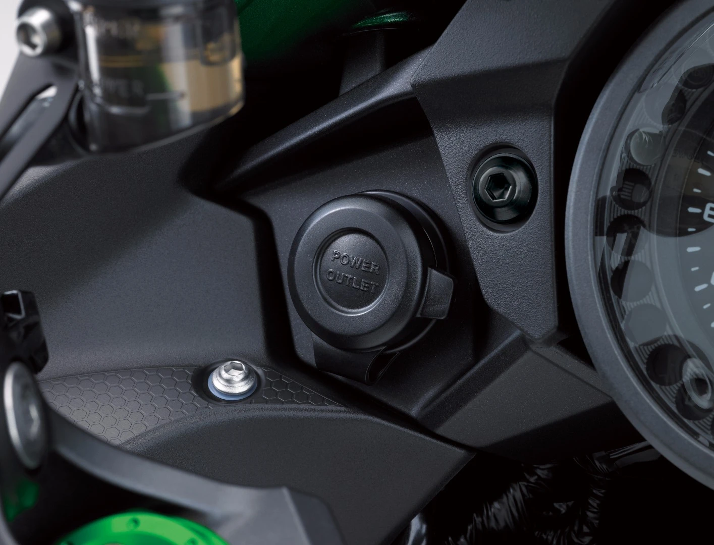 The 12 V DC outlet is standard feature on the 2018 Kawasaki H2 SX SE and can be optionally ordered for the basic model
