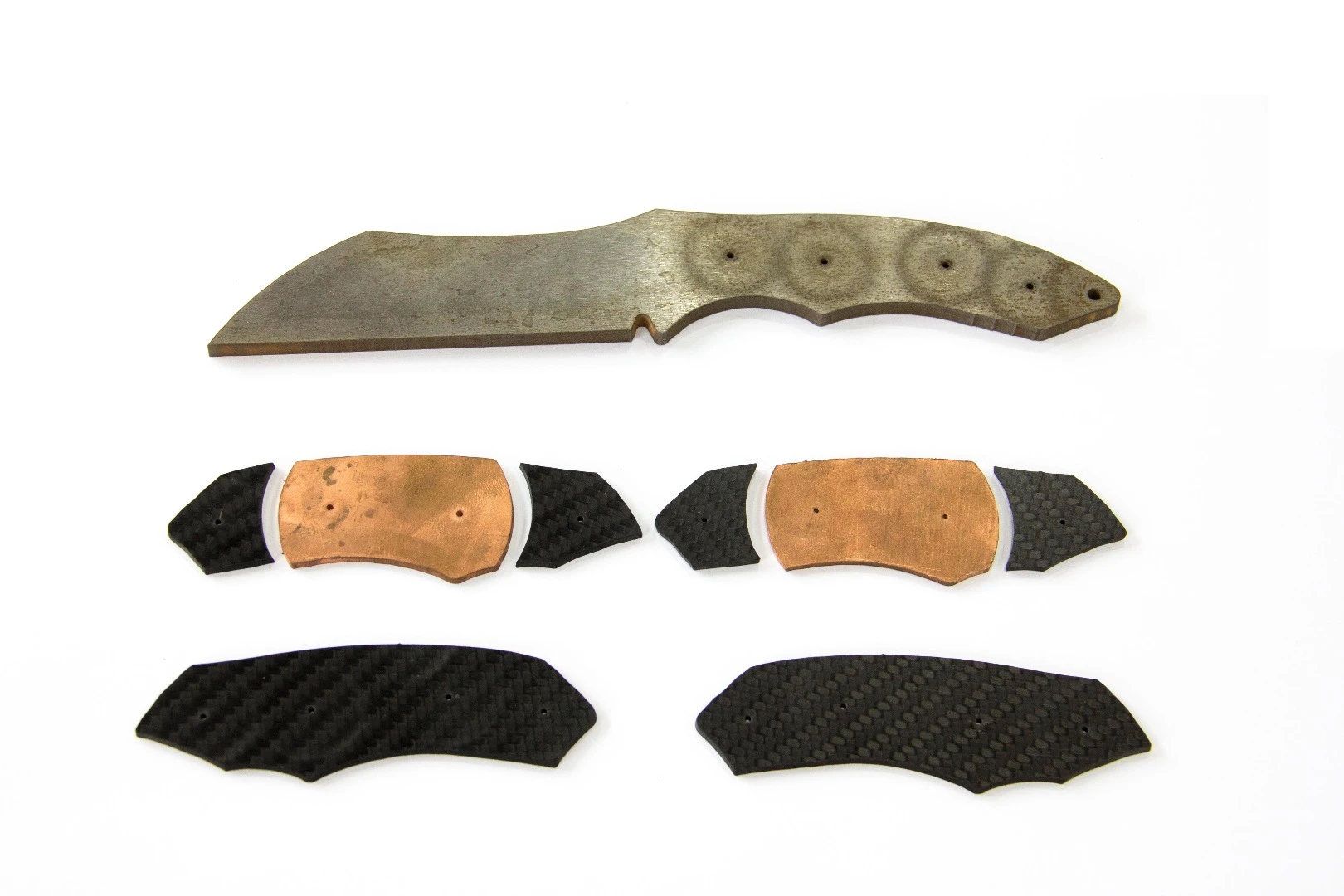 Pieces of a knife cut using the Wazer waterjet cutter