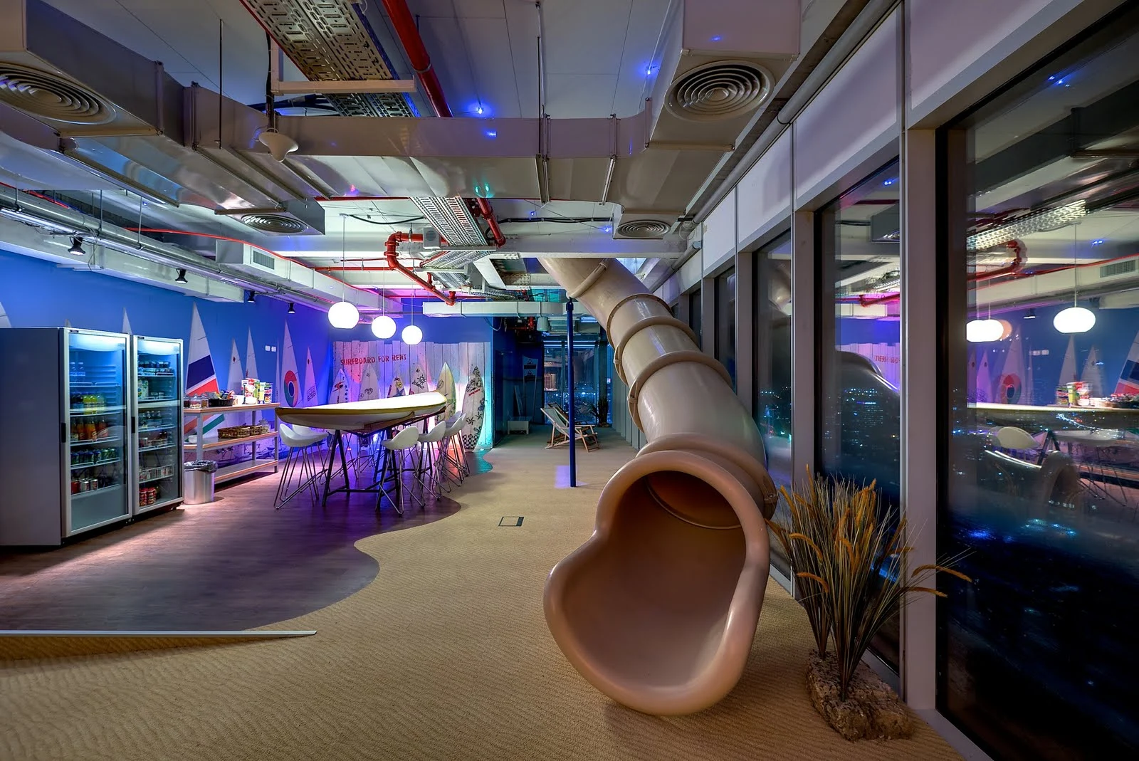 Computer desks are almost a non event, as not to distract from the surreal environment created inside (Photo: Itay Sikolski)
