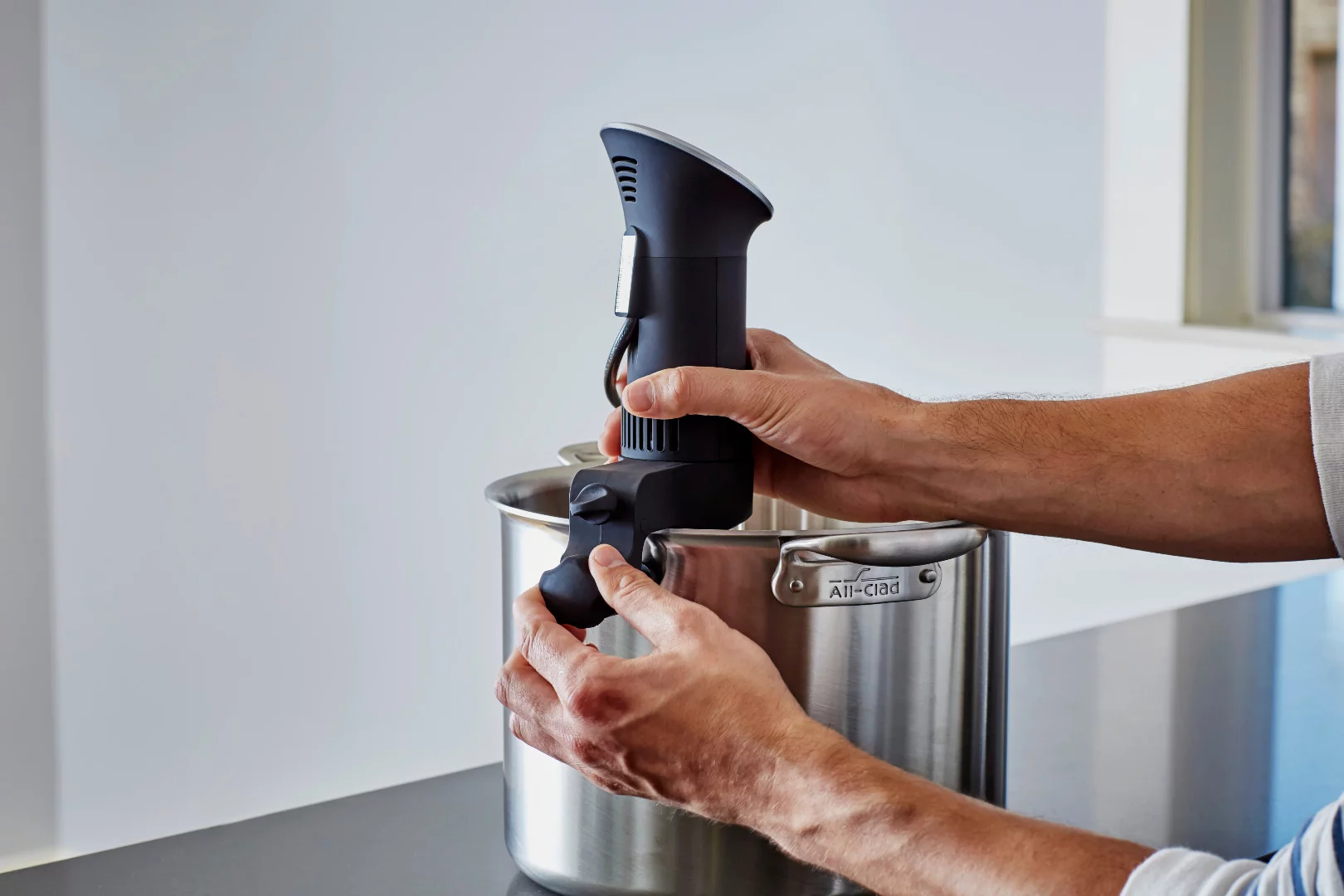 The Anova sous vide attaches to the side of most pots