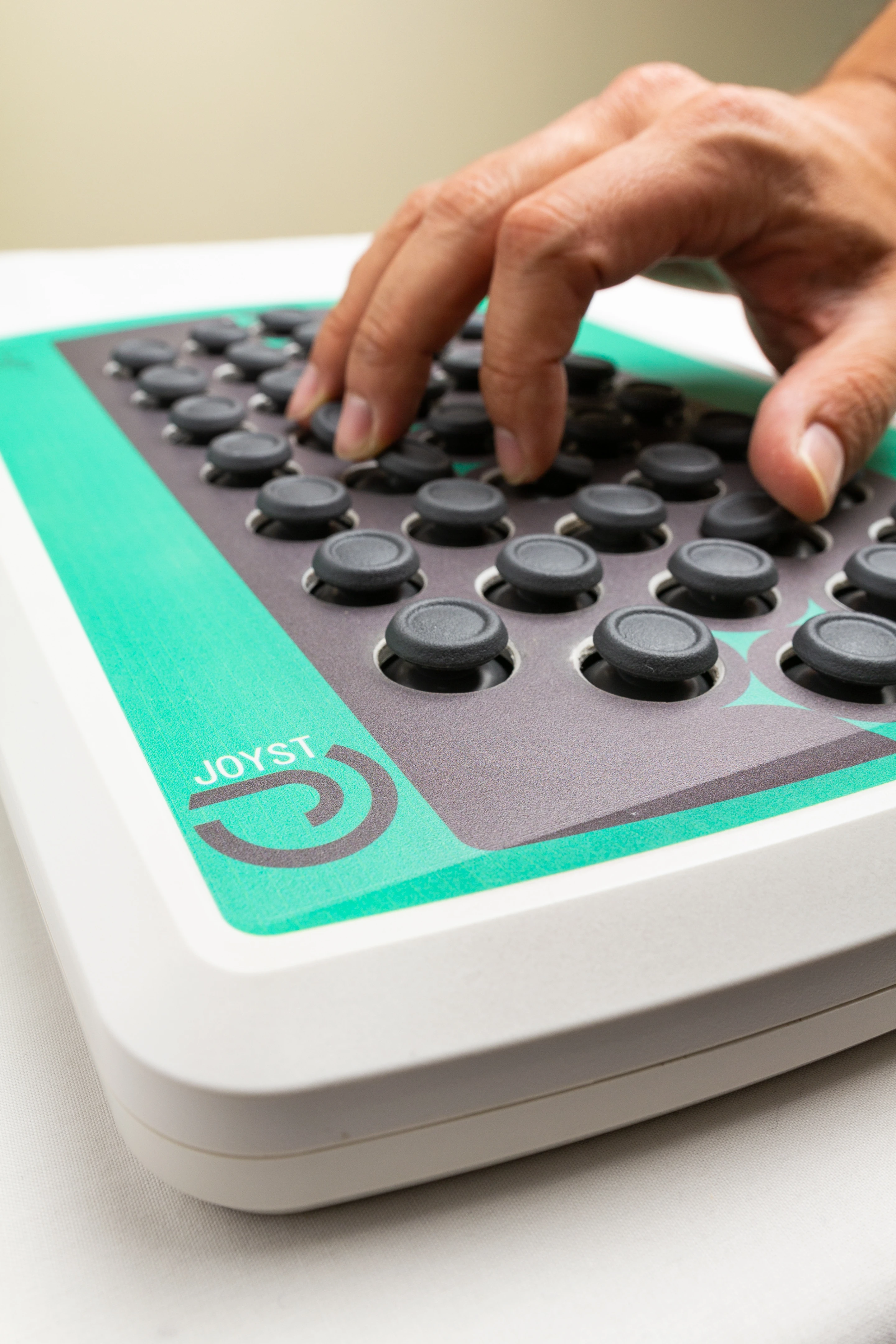 Midi Controller Hand MIDI controller uses mini joysticks for expressive music creation