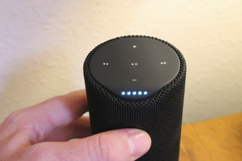 Pressing Tap's microphone button cues it to listen for commands