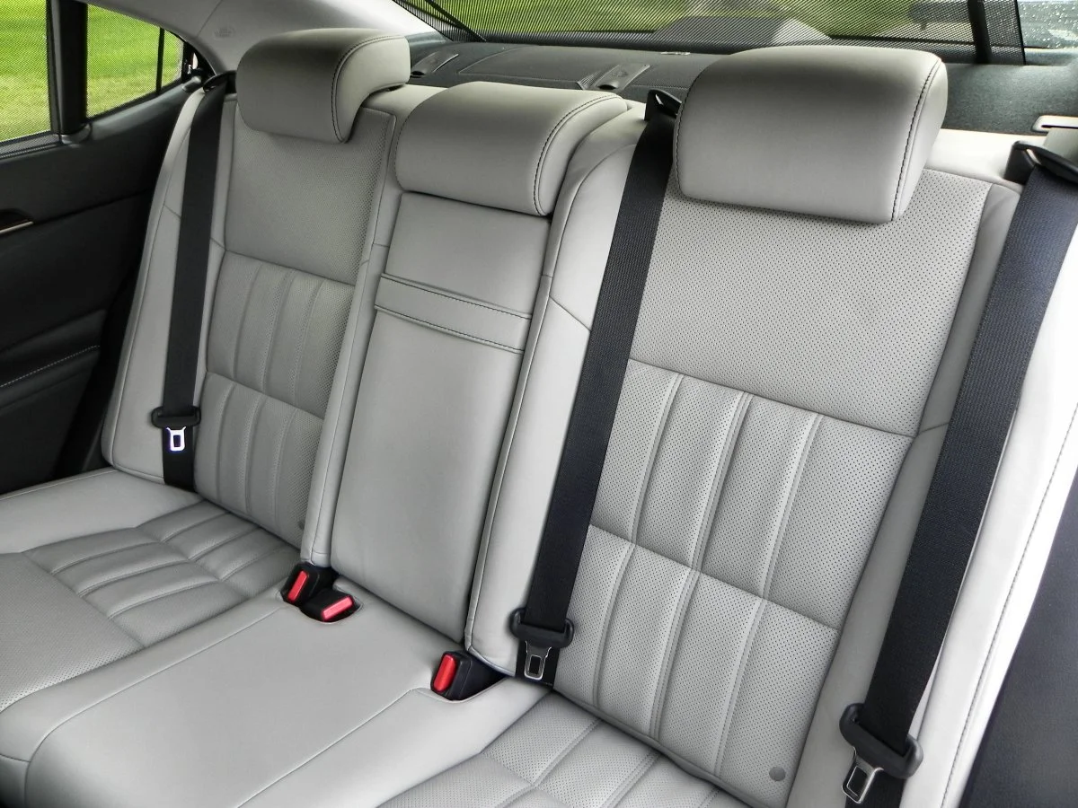 The back seat is very roomy, but does not fold down for trunk access