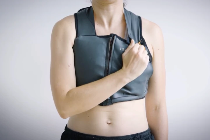 The SwimVest deploys three flotation airbags with a pull of its handle