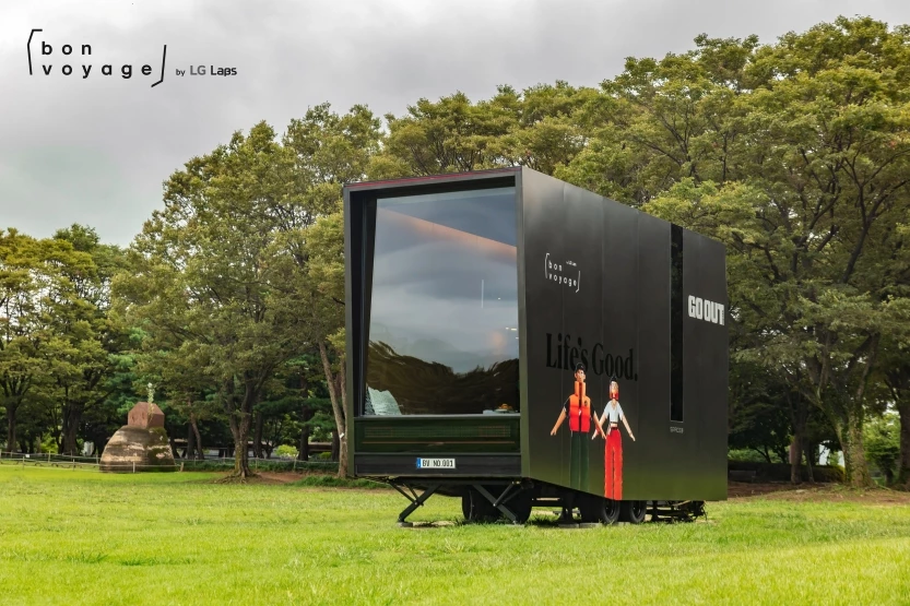 The original Bon Voyage connects with nature via a full-height glass wall; it's not clear from LG's single rear 3/4 photo if the 2024 Bon Voyage 2.0 has a similar glass wall up front, but it definitely has a large rear window on its lift-gate