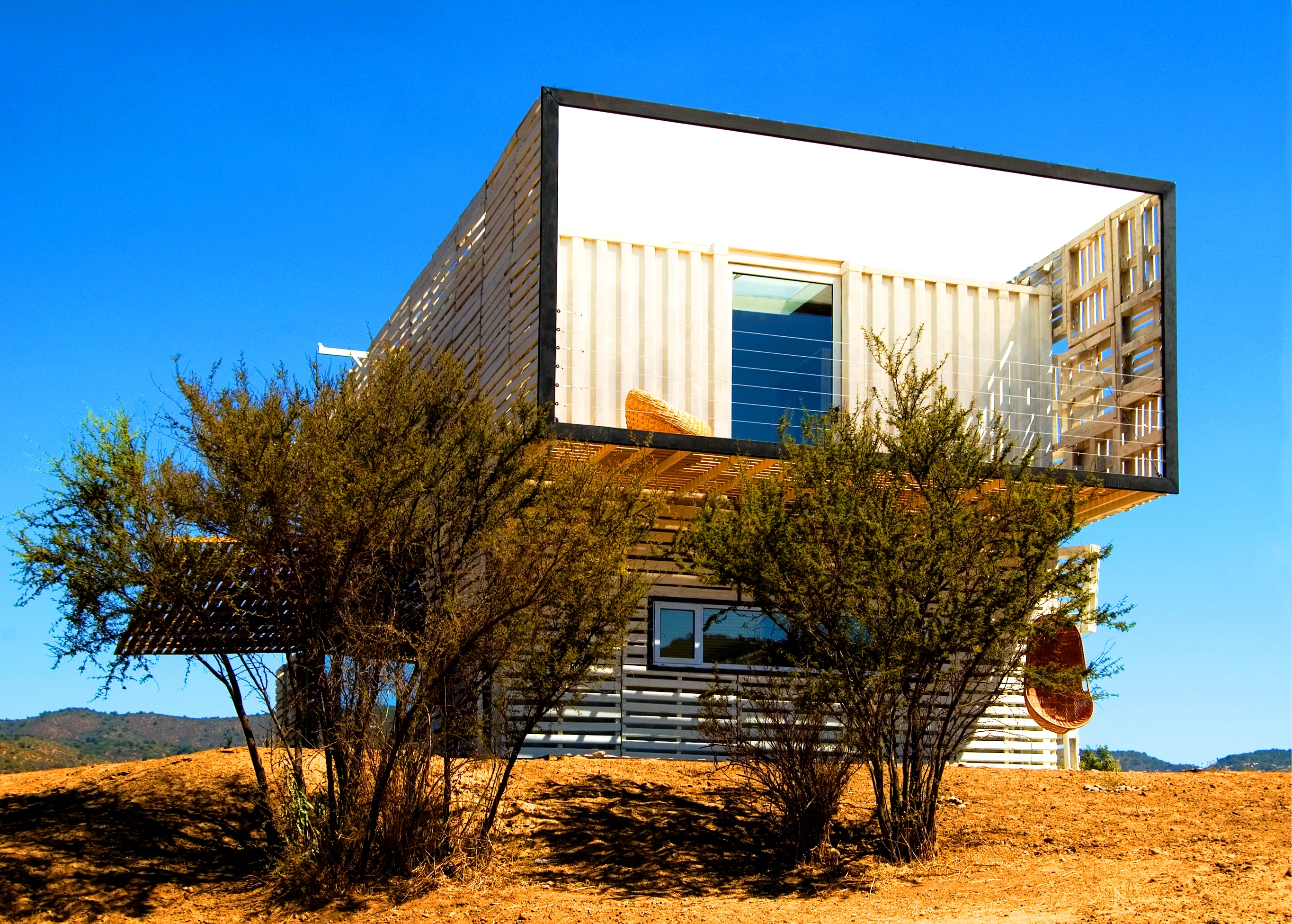 Infiniski's sustainable house designs are up to 80-percent comprised of reused, recycled and non-polluting materials like shipping containers, railway tracks, forklift paletts and even old bottles