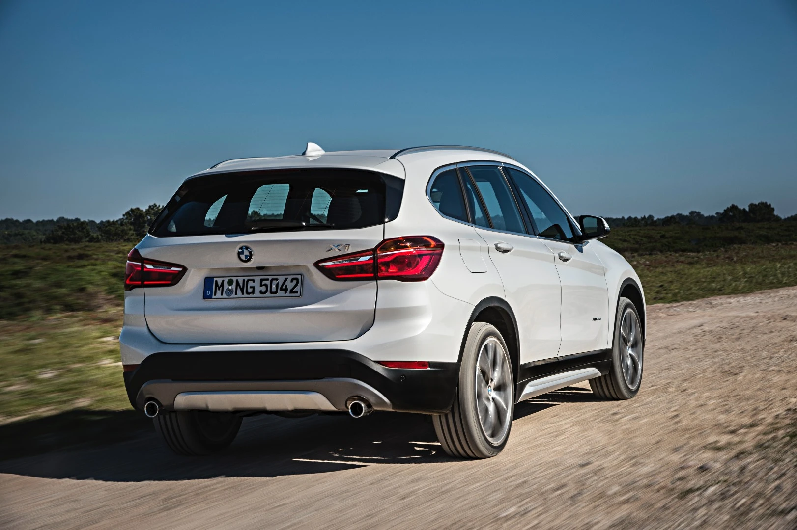 At the back, the X1 looks more solid on the road