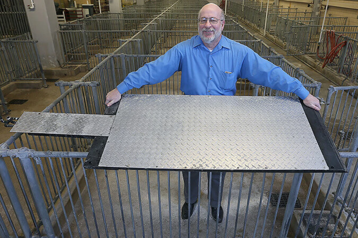 Prof. Robert M. Stwalley III with one of the prototype hog-cooling pads