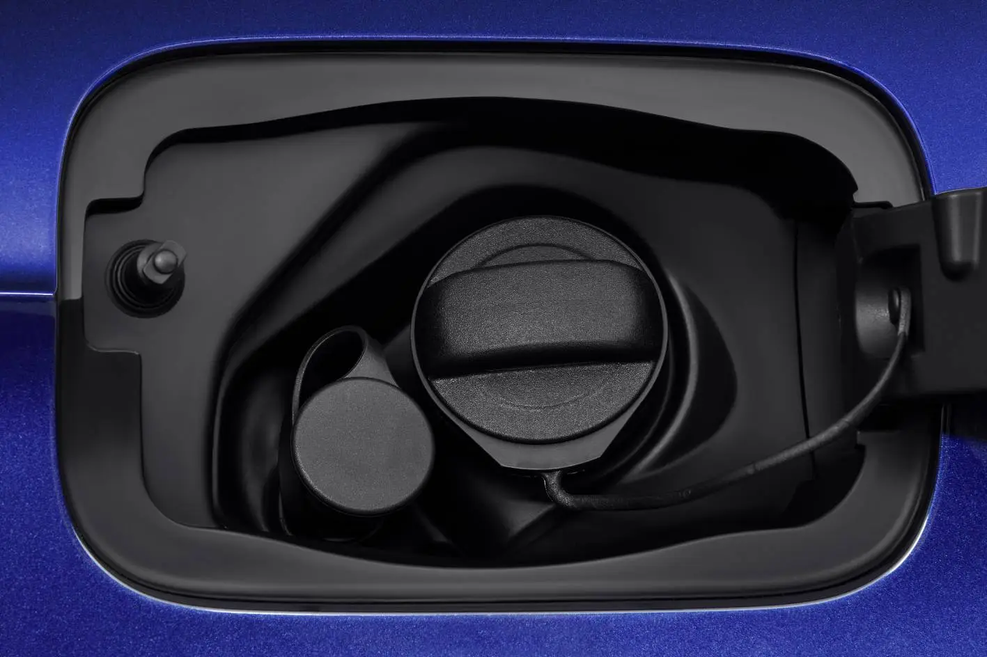 Twin filler caps for the twin fuel options