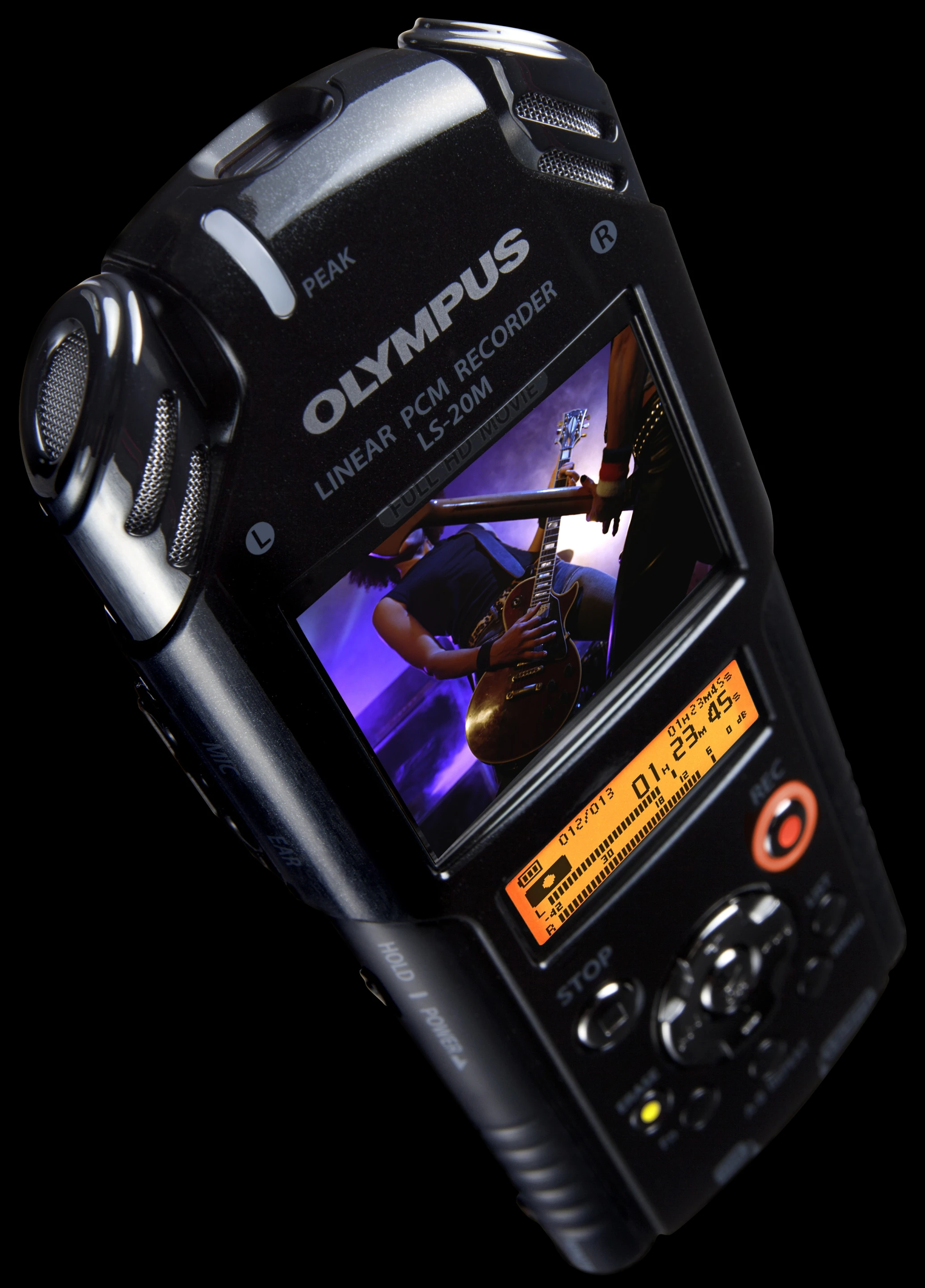 Numerous control buttons are situated underneath the displays to the front, including a record button which illuminates when activated