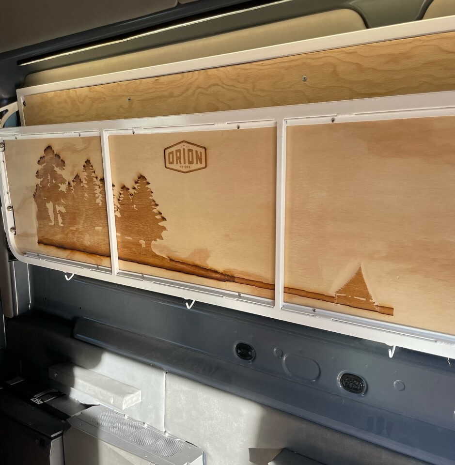The couch folds up into the sidewall, taking up minimal space when traveling