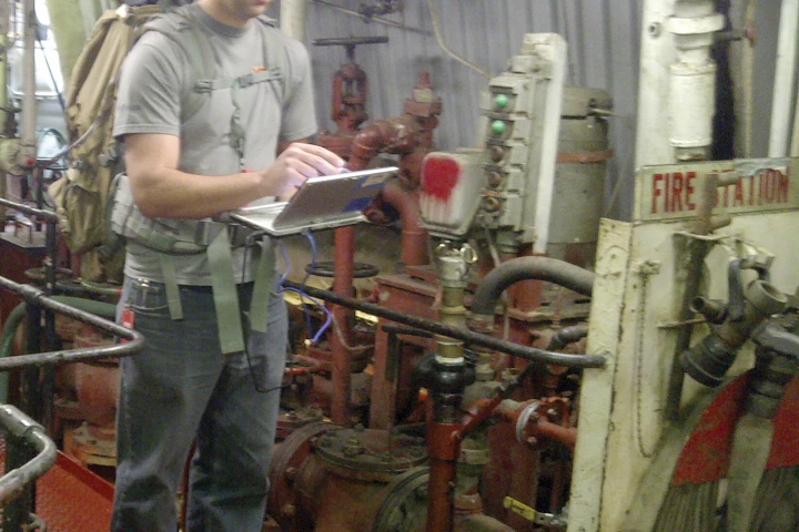 The backpack-mounted Enhanced Mapping and Positioning System (EMAPS), being tried out aboard a ship