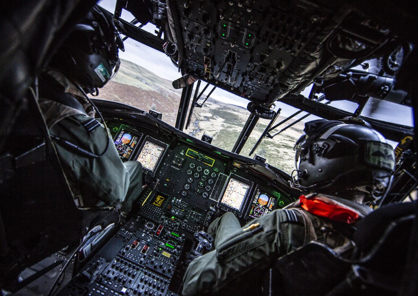 Description: Image taken from the Cockpit of Chinook Mk5 from 27 Sqn flying a Tactical evaluation sortie over Dartmoor. This Included moving Royal Marines as part of their own Training Exercise Low level Flying and undertaking a rear wheel Landing on one of Dartmoors many tors. © MOD Crown Copyright 2018 Photographer: Cpl Rob Travis RAF Cpl Rob Travis and is currently based at RAF Odiham. He joined the RAF in June 2004 since then he has served at RAF Cottesmore, RAF Scampton, RAF Lossiemouth, The Red Arrows, RAF Cosford and RAF Valley. He has completed many detachments all over the world.