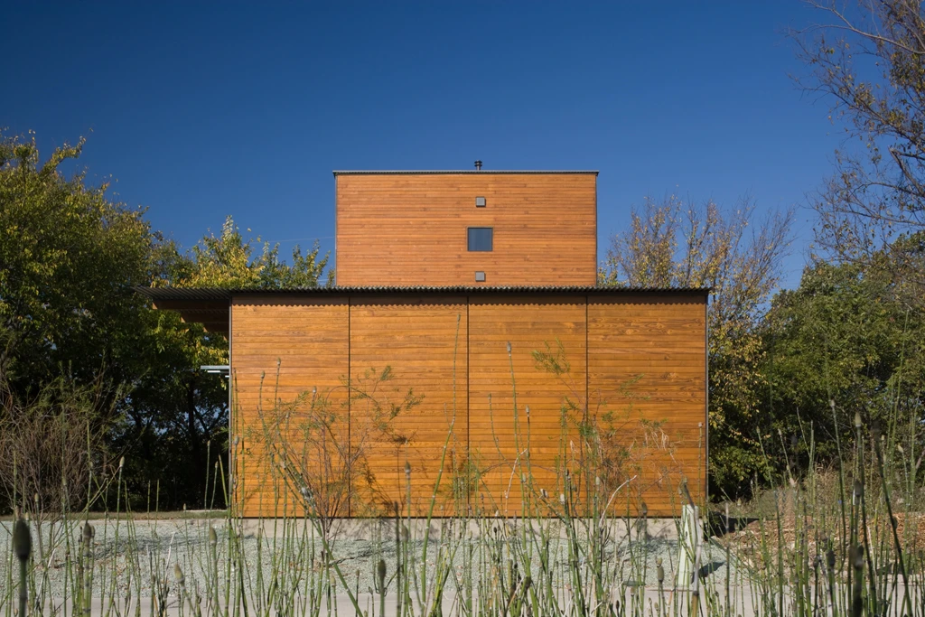 Pressure-treated wood is used as a siding material (Photo: Charles Davis Smith)
