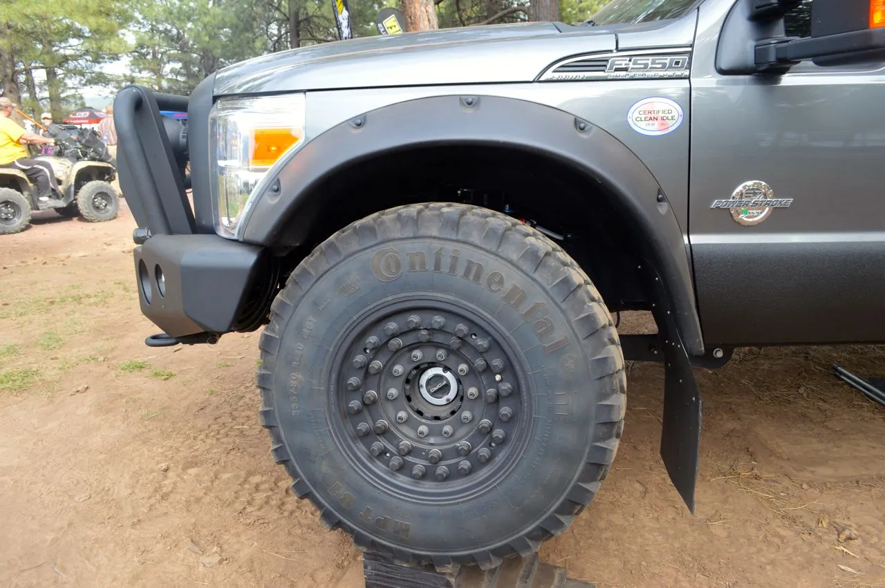 The 41-in Continental MPT-81 tires mounted to military headlock rims offer a minimum ground clearance of 12.4 in (31.5 cm)